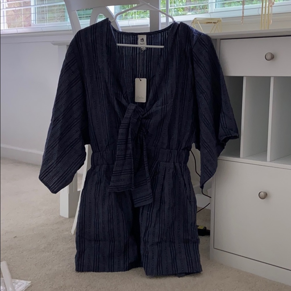 TAGS ATTACHED navy front tie romper